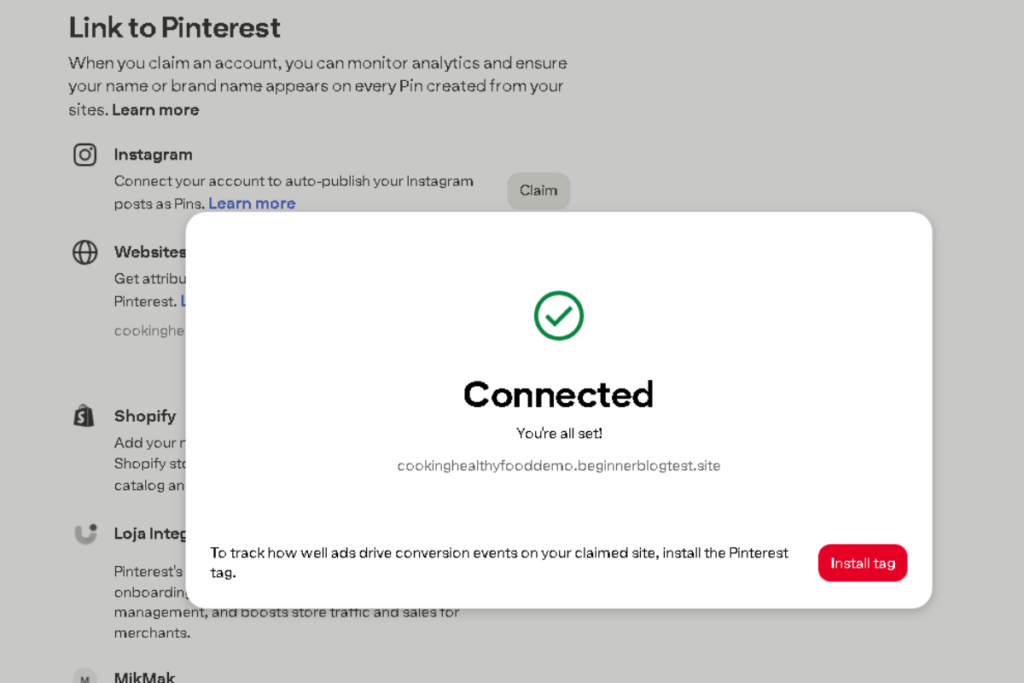 Pinterest confirmation screen showing a green checkmark and the message “Connected — You’re all set!” indicating successful website verification